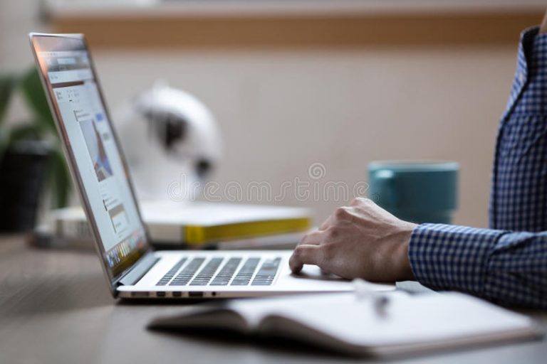 person-working-laptop-computer-954095261